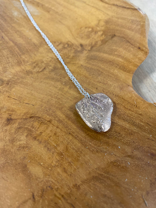 River Rock and Cedar cast necklace